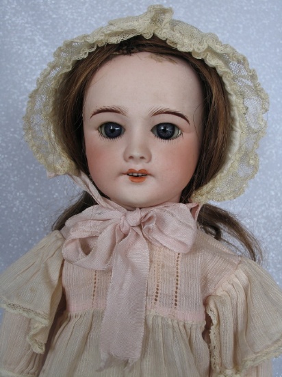 Bisque French S.F.B.J. 301 child 17" (43cm) doll. Vertical vee hairline fro