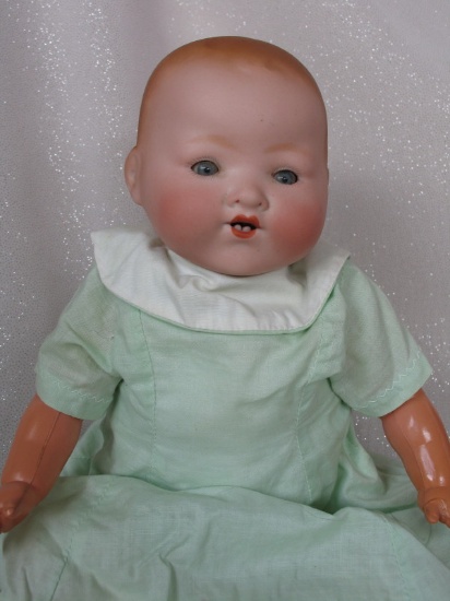 Dream baby Armand Marseille 352 33cm (13") cabinet swivel bisque doll. Blue