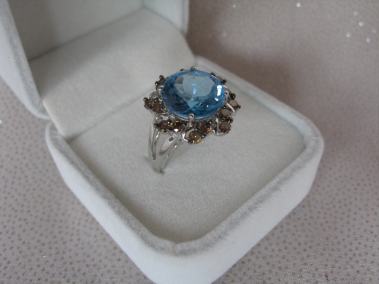 Ladies 10K White Gold Topaz & Diamond dress ring, stamped 10K. Swiss Blue T