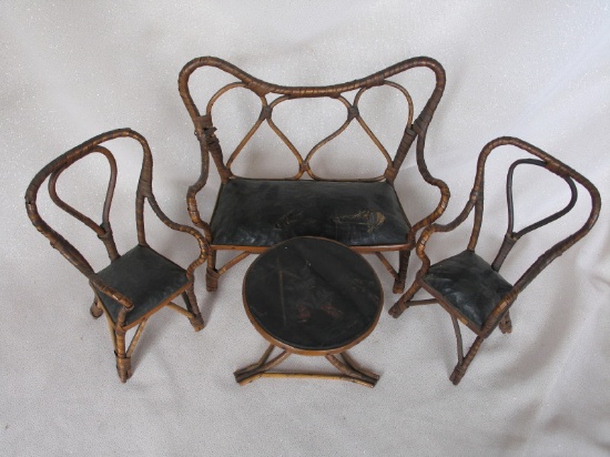 Four-piece French 1890s Faux-Bamboo Bentwood doll furniture set. Two chairs