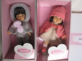 Two Boxed Llorens 29cm child 2000s vinyl dolls. Both in all original and bo