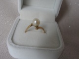 Two estate Gold Ladies Pearl Rings:- 14K White Gold with two morning drew p