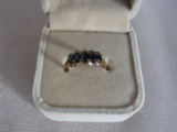 Ladies Estate 18K Gold dress ring stamped 18K. Five central sapphires, 9 di