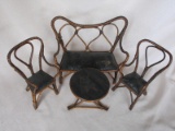 Four-piece French 1890s Faux-Bamboo Bentwood doll furniture set. Two chairs