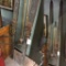 Antique wooden snow skis with bamboo poles