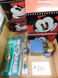 4 Never been Opened Disney Collectors Watches and 4 Disney Collectors Boxes