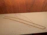 TWO 14K GOLD CHAINS AND GOLD RINGS