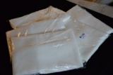 FIVE NEW NEVER USED TABLE CLOTHS