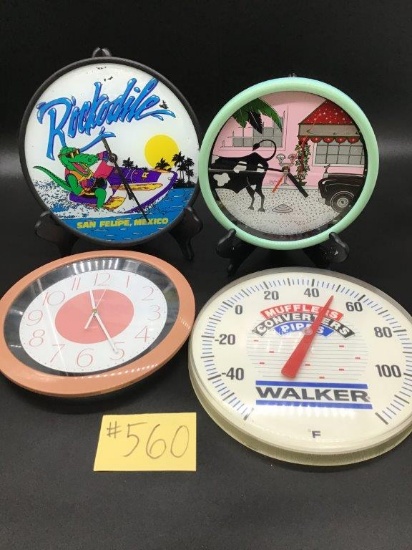 THREE BATTERY OPERATED WALL CLOCKS & THERMOMETER