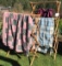 TWO WOOD DRYING RACKS WITH BLANKETS