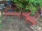 TWO RED METAL ROCKING PATIO CHAIRS AND A BENCH