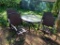 FOUR SWIVEL PATION CHAIRS AND MATCHING GLASS TOP TABLE