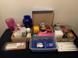 LARGE LOT OF CANDLES AND TWO VASES