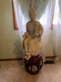 STATUE OF ASIAN LADY ON A WOOD STAND