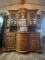 GLASS AND WOOD WITH CURVED FRONT CHINA CABINET