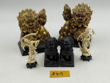 TWO MATCHED SETS OF CHINESE GUARDIANS AND TWO ASIAN FIGURES ON STANDS