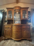 GLASS AND WOOD WITH CURVED FRONT CHINA CABINET