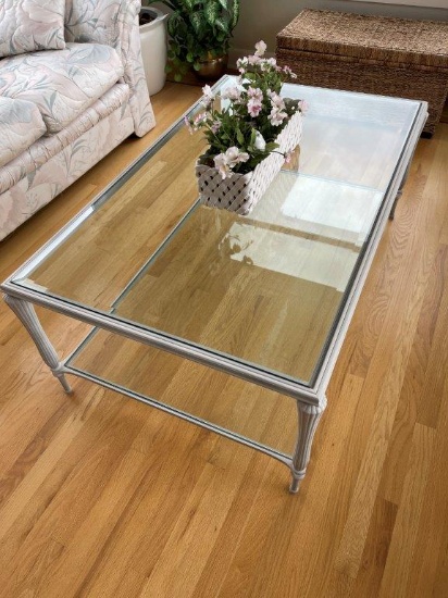 HOME FURNISHINGS: SIMPLE RECTANGULAR METAL BASE COFFEE TABLE WITH GLASS TOP.
