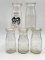 FIVE ANTIQUE GLASS MILK JARS