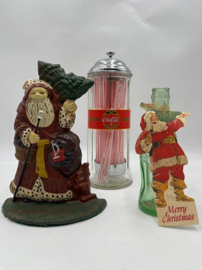 COCA-COLA COLLECTIBLES AND A CAST IRON SANTA DOOR STOP