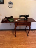 ANTIQUE SEWING MACHINE IN CABINET WITH ACCESSORIES