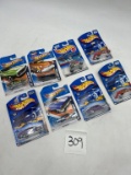 EIGHT HOT WHEELS IN ORIGINAL PACKAGING COLLECTIBLE