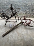 ANTIQUE SPINNING WHEEL, YARD ART AND TWO ANTIQUE PURPLE GLASS JARS