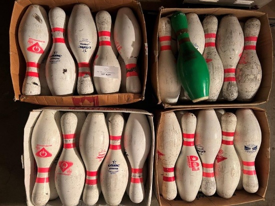 FOUR BOXES OF BOWLING PINS