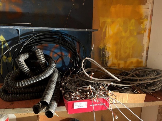 SHELF FILLED WITH ELECTRIC WIRES