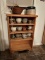 SMALL BOOKSHELF WITH STONEWARE PLANTERS AND POTS