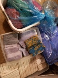 TWO LAUNDRY HAMPERS AND LARGE AMOUNT OF TOWELS