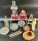 OIL LAMPS, WIND CHIME, BOTTLE, DISPLAY STAND, AND ASIAN STATUE