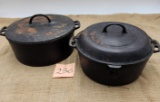Two Cast Iron Dutch Ovens