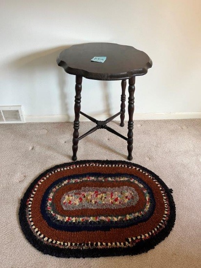 Dark Stain Side Table with Turned Spindle Legs, and an Oval Area Rug