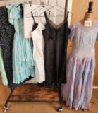 Assortment of Women's Dresses and Slips