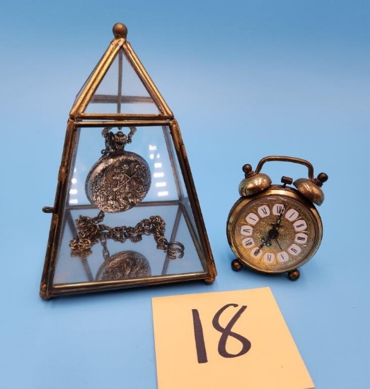 Glass Display with Pocket Watch and Brass Alarm Clock
