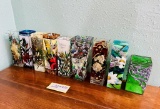 Collection Of Glass Vases With Colorful Scenes