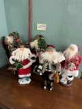 Display Santas In Traditional Outfits