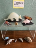 An Armada Of Armadillo Figurines