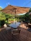 Glass Top Patio Table With Four Chairs And Umbrella