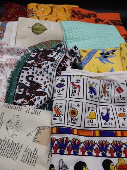 Collection of Fabric with Various Patterns and Tapestries