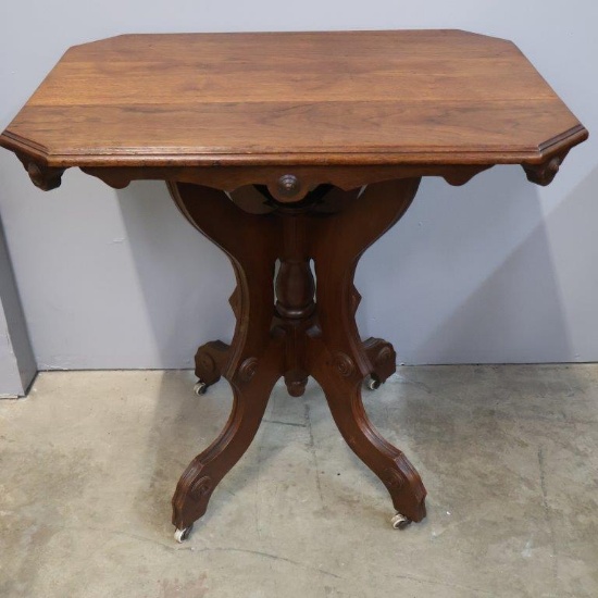 Walnut Victorian Parlor Table Porcelain Casters