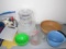 Pyrex glass measure cup; Ice bucket; (3) Mixing bowls; Measuring cups; Apron; Casserole holder