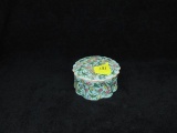 Porcelain hand painted floral covered dish. 2.5