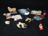 Box lot of Animal Figurines: 2 Clay cows- marked, 4 sheep - marked, Loon, xmas ornament