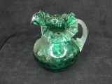 Green glass pitcher w/clear handle, scalloped edge, thumb print design; 9.5