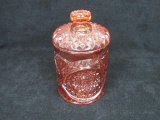 Imperial amethyst cut glass covered jar; 8.5