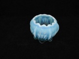 Fenton blue opalescent footed bowl w/scalloped edges & floral relief design. 5