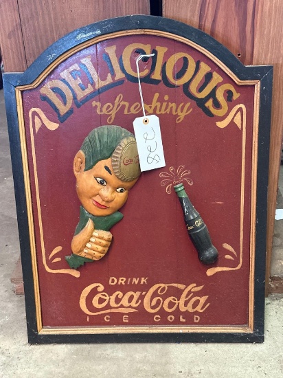 wooden Coca-Cola sign