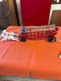 vintage cast horse and buggy firetruck toy